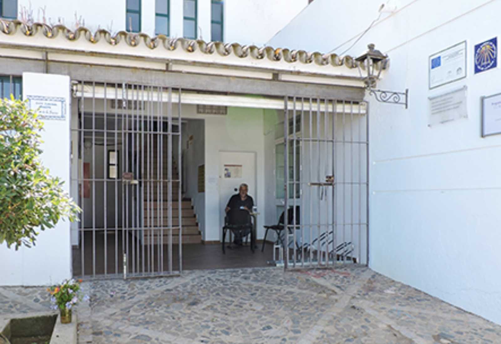 Entrance of the pilgrim hostel in Castilblanco de los Arroyos with the Camino scallop shell, Vía de la Plata.